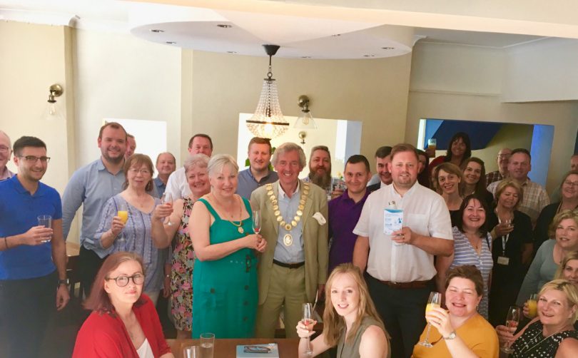 Mayor Anthony Lowe pictured with the town’s retailers and businesses at the get-together