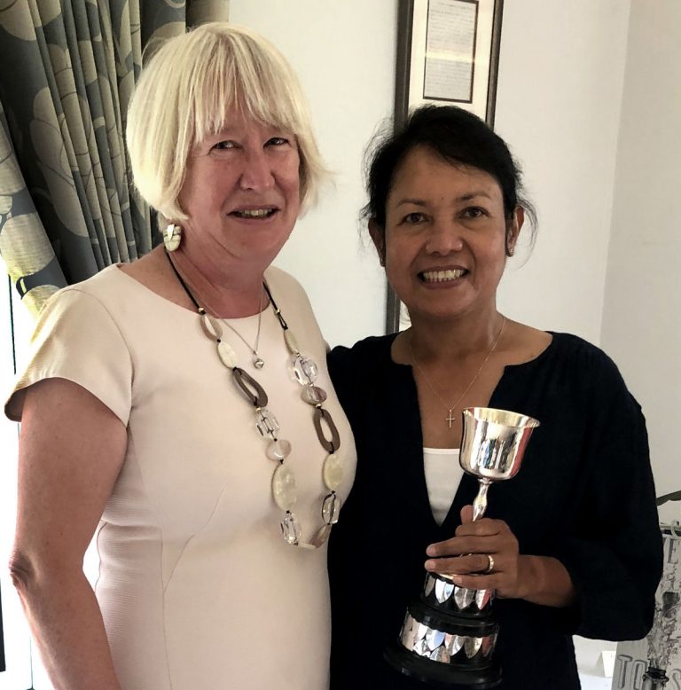 Ladies Captain Joy Foster presenting Marlyn Radford with the Away Day Trophy. Photo: Vanessa Statham
