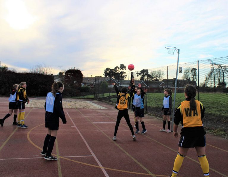 Students take part in a netball match