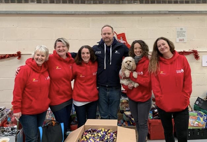 James Worthington, Managing Director of MyWorkwear with members of the team from Christmas Smile