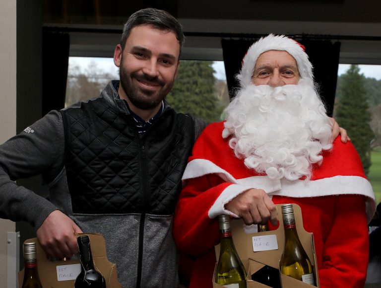 Winner of the 11:30 Group Greg Hughes with Santa Clause