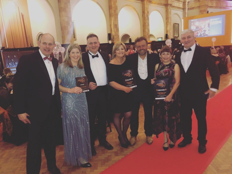 The finalists for the Self Catering Accommodation of Year pictured with Homes Under The Hammer host Martin Roberts
