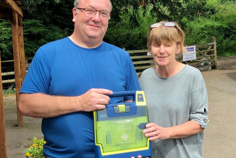 Nick Freeman, Telford Community First Responder and Jenny Joy, café owner