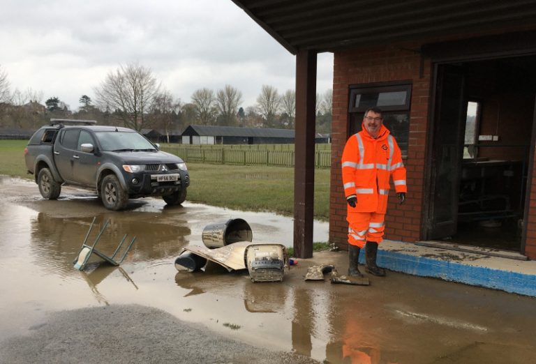 Ian Bebbington, chief executive of the Shropshire and West Midlands Agricultural Society cleaning up after the flooding