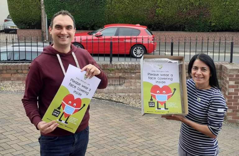 Matt Kent of Emerge graphic designers and Paola Armstrong of Wellington Town Council pictured with the posters