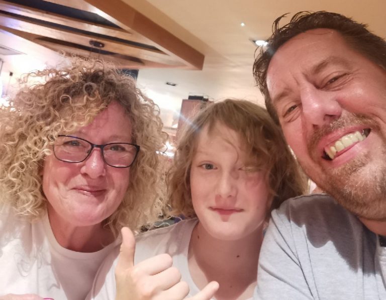 The bride and groom with Neal's 13-year-old son Callum who is best man