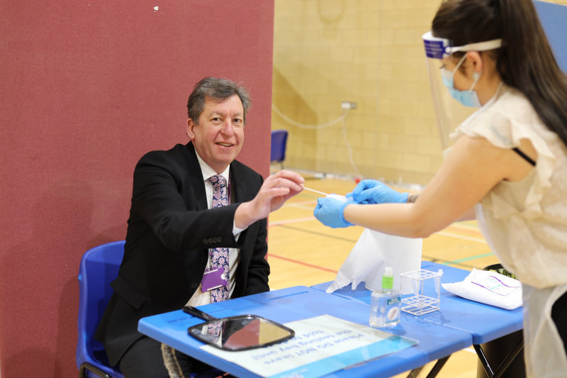 Principal Graham Guest is the first to receive a test in Telford College’s new Covid test centre.