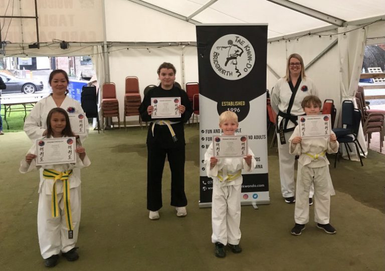 Thanh Dang, Lizzie Sterling, Instructor Anna Bradford (back) Cain Baker, Selby Bradford, Ari Carson (front)