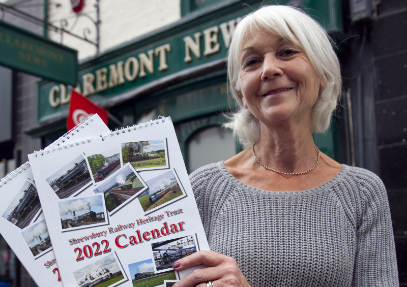 Val Woodvine of Claremont News with the 2022 calendar