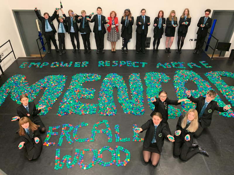 Staff and students at Ercall Wood with the 36,000 bottle tops
