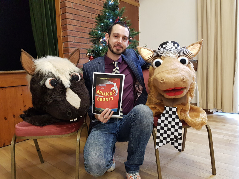Writer and director Shaun Higgins accompanied by pantomime horses Doom Biscuits and Felicity Fetlocks