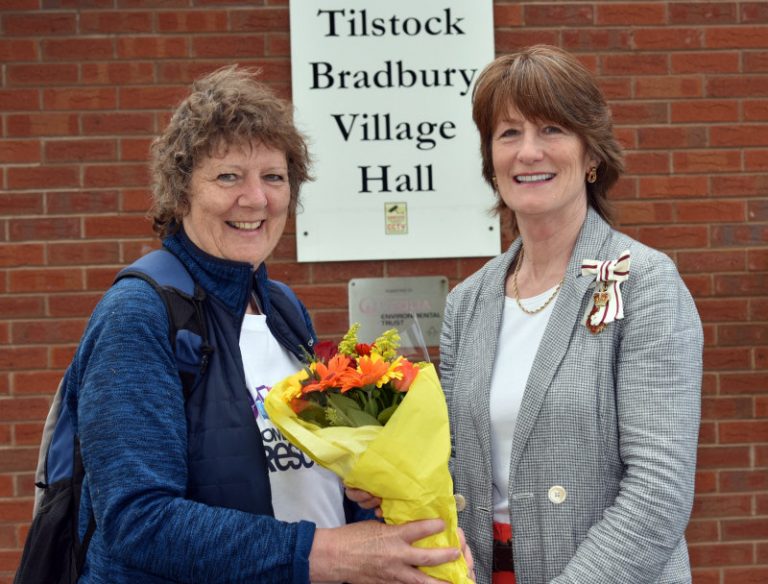 Julia Baron and the Lord-Lieutenant of Shropshire, Anna Turner, who presented Julia with flowers at the finish line