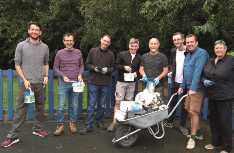 Aico colleagues carrying out maintenance work at Hope House in Oswestry