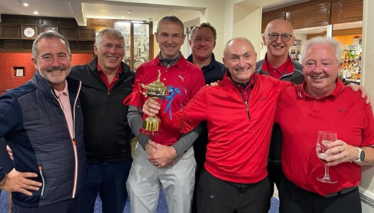 Celebrating the win are, from left, Mitch Gough, Adrian Burton, Simon Burdon, Neil Atkinson, Martin Pitchford, Mark Freeman, and Peter Richardson