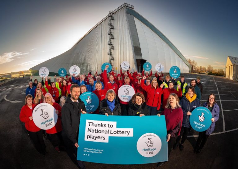 RAF Museum team celebrate investment from The National Lottery Heritage Fund. Photo: © RAF Museum