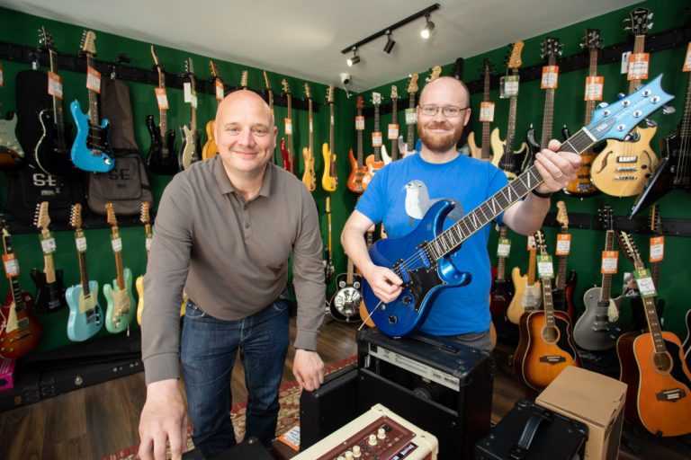 Councillor Lee Carter (Lab), Telford & Wrekin Council’s cabinet member for place (the economy & neighbourhood services), left, with Music Vault owner Jake Taylor. Photo: Telford & Wrekin Council