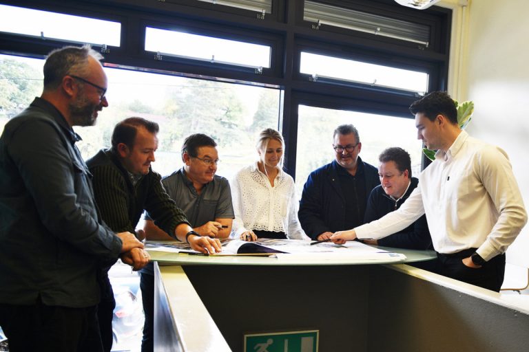 Members of the Johnson Design Partnership team, Mike Morgan, Vic Johnson, James Spencer, Matt Spinks, Rich Coutts, Becky Bradley and Andi Clews