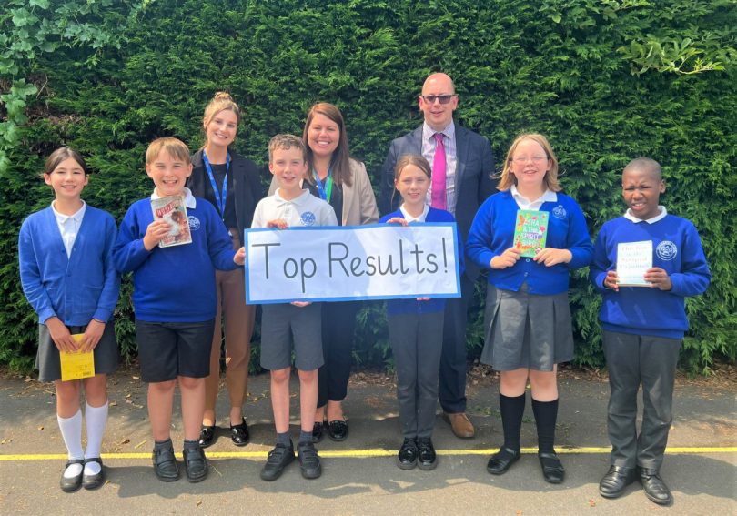 Hannah Gharu, year six teacher and assistant head, reading lead and teacher Esther Jones, and headteacher Adam Ames with pupils from Crudgington Primary School, celebrating their 100 per cent success