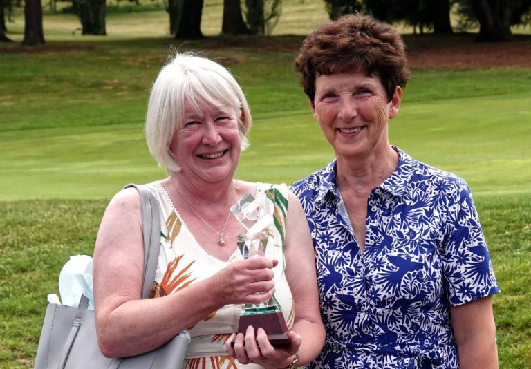 2023 Ladies Captain – Suzanne Huxley presenting Joy Foster with 1st prize in Division 1 and the Brenda Camm Trophy for the Best Stableford Score on the day. Photo: Mike Purnell