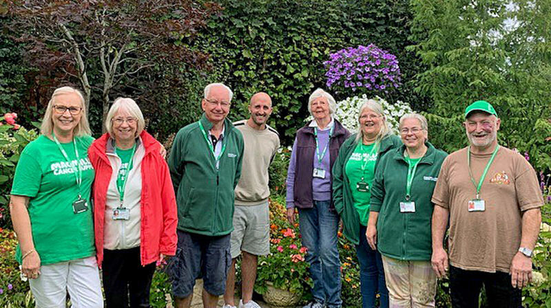 Tom Pountney (centre) with members of Macmillan Cancer Support’s Shrewsbury Fundraising Group in his garden