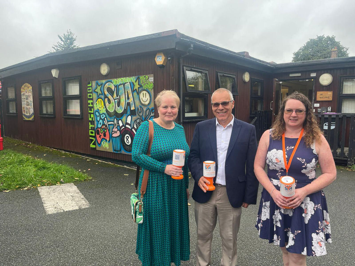Chair of SYA trustees Donna Leeding, SYA chief executive Richard Parkes and fundraising manager Claire Purcell