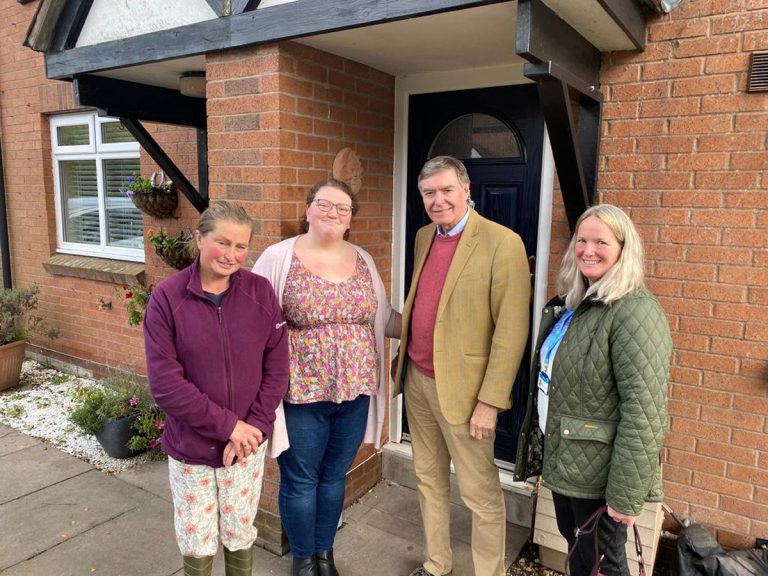 Philip Dunne chats to local residents Anne Hone, and Leanne Jones in Swains Meadow