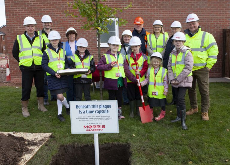 Prees School Children join Morris Property, The Wrekin Housing Group and the local community to bury a time capsule on site in Prees