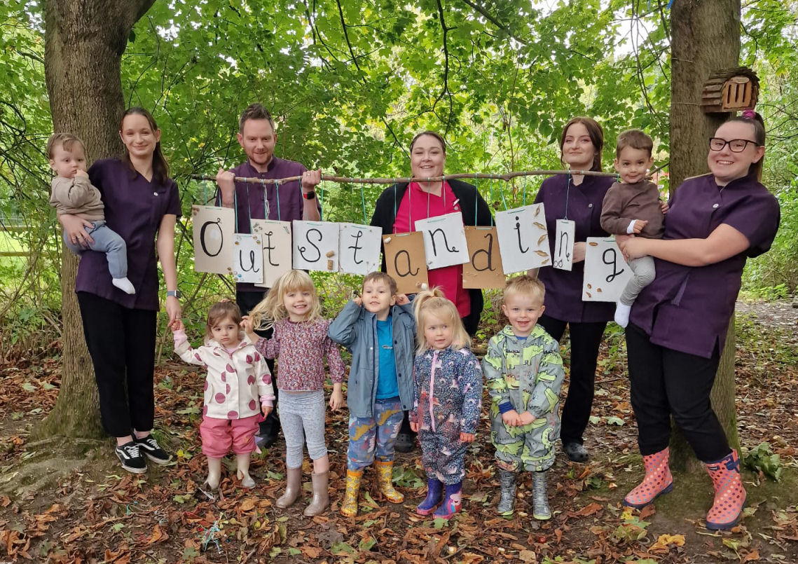 Staff and children from ABC Hoo at Preston upon the Weald Moors in Telford celebrate the latest Ofsted Outstanding rating