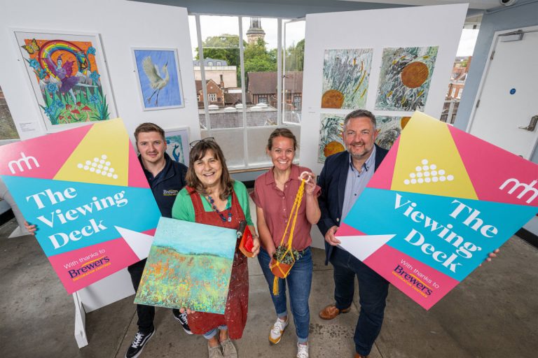 Brewers Decorator Centre regional manager Marcus Ward and Shrewsbury branch manager Dan Duce on the newly repainted Viewing Deck with Shrewsbury Market Hall stallholders Alison Staples and Karen Duffy