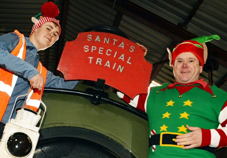 CHR Volunteer Harrison Gillham alongside Santa Helper David Roberts gearing up for the Cambrian Santa Specials