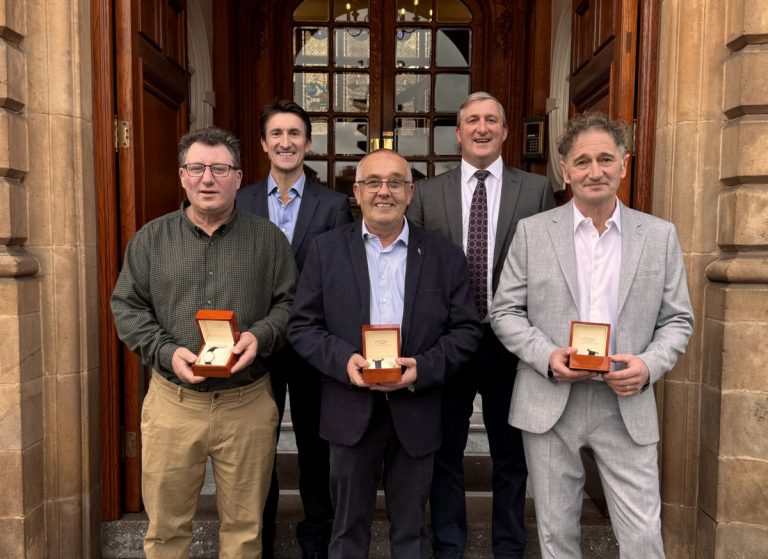 Martin Weaver, Phil Griffiths and Pete Allworth celebrate 25 years of service with Chris and Robin Morris