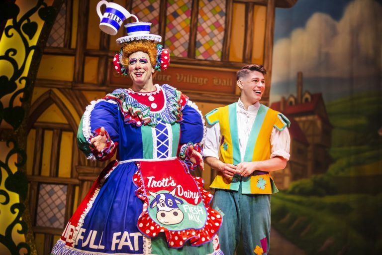 Dame and Director Brad Fitt and Tommy J Rollason on stage at Theatre Severn. Photo: Pamela Raith Photography