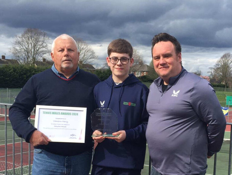 Cameron Parry pictured with Jamie Clewer, Head of Participation for Tennis Wales, and Geoff Scott, Chairman of the North Wales Committee.