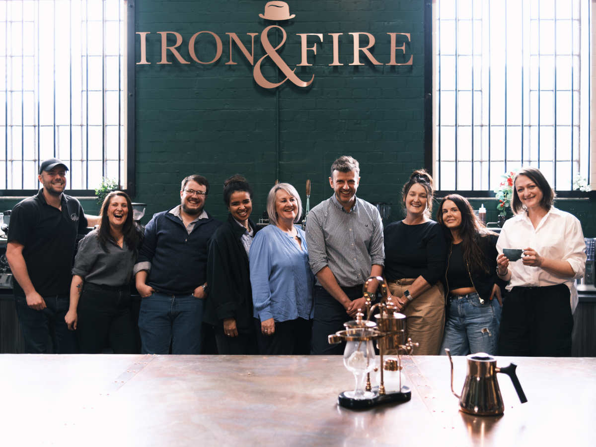 Pictured are Ryan Cowdell from Iron & Fire on the left with Joanna De Rycke, of Iron & Fire on the right and Oliver Parrish fourth from right with his team members from the Woodbridge Inn