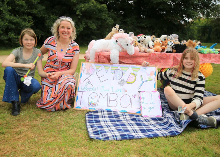 Pictured at the Teddy Tombola are Megan Ginder, Grace Ginder and Sally Ginder