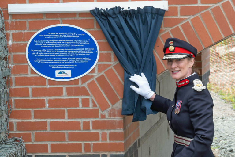 Lord Lieutenant of Shropshire Anna Turner unveils the plaque at the opening of Whitehouse Bridge.