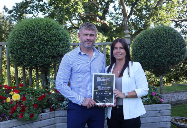 Jason and VIcki Bell with their award certificate