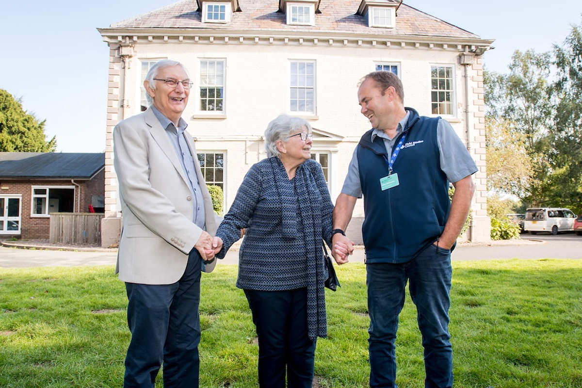 Patricia de Haan and her husband David enjoy a tour of the Field Studies Council Preston Montford site with centre manager Arran Holdsworth