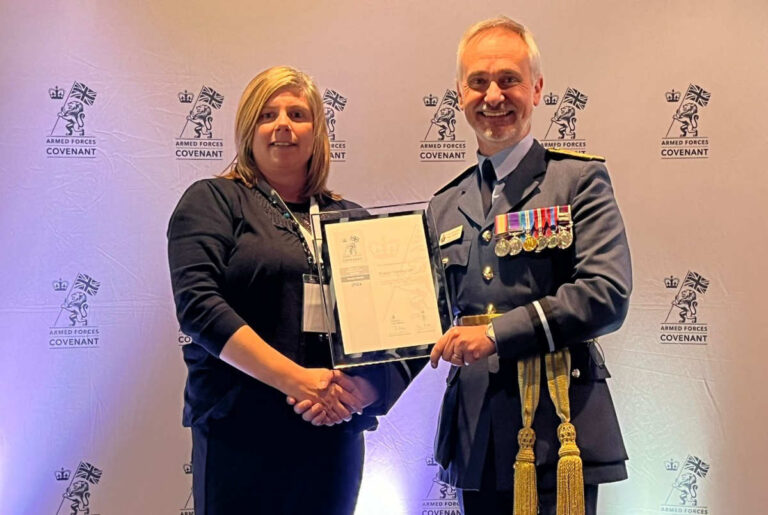 Hayley Norgrove, Dulson Training's Director of Operations, receiving the award