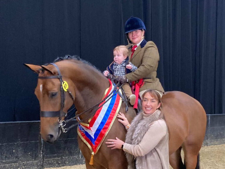 Samantha with her son Hugo and Redshaw Valentino's breeder Joanne Shaw. Photo: Jenny Viner