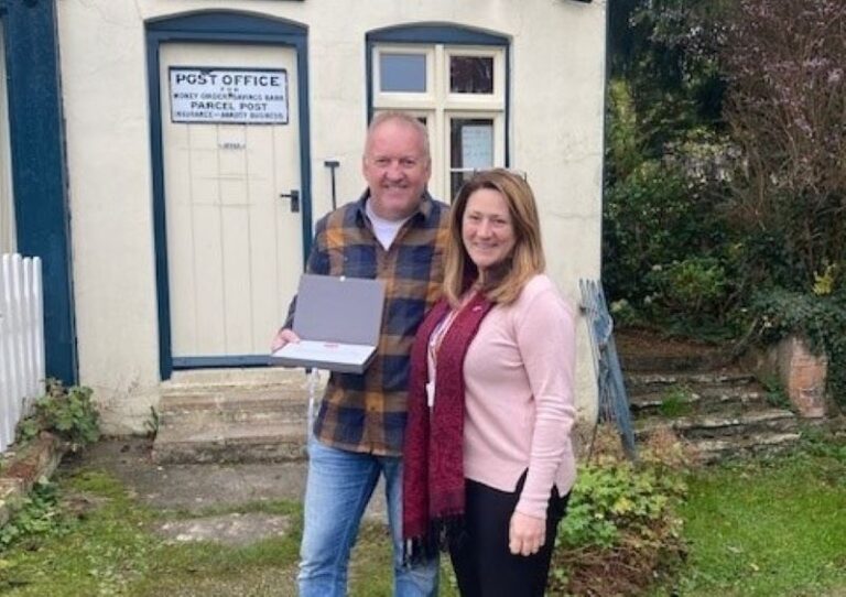 Bucknell Postmaster Klaus Steffes is pictured with Post Office Area Manager, Jennifer Pougunas
