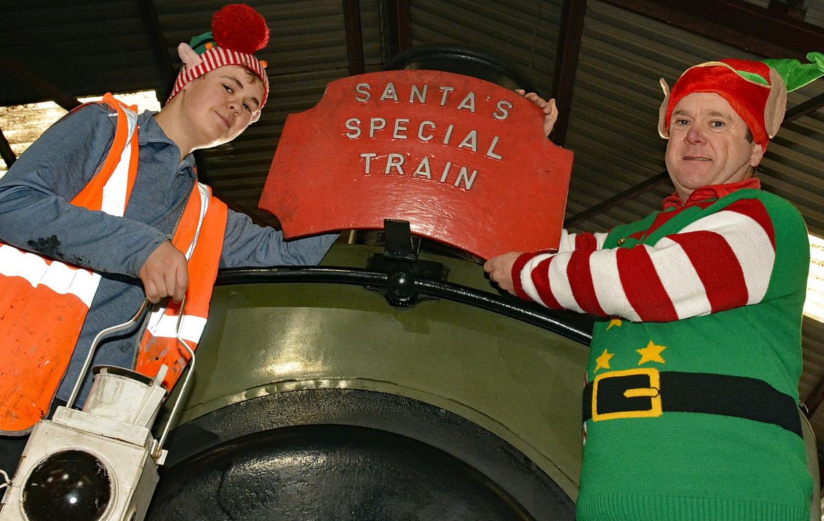 CHR Volunteer Harrison Gillham alongside Santa Helper David Roberts gearing up for the Cambrian Santa Specials