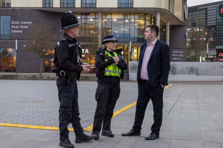 Shaun Davies MP, with police officers in Southwater, Telford