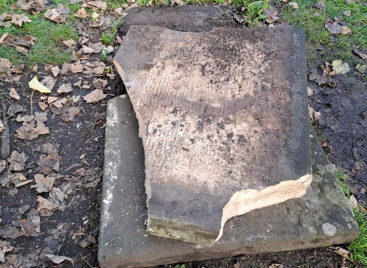 The gravestone of the famous Charles Dickens' character, Ebenezer Scrooge, has been destroyed. Photo: West Mercia Police