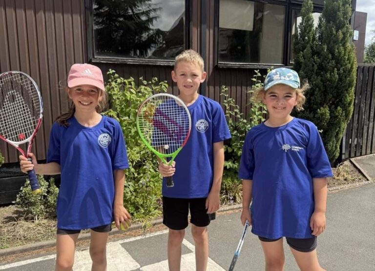 Anyone for tennis... Olivia Moore, Matthew Evans, and Sadie Brown
