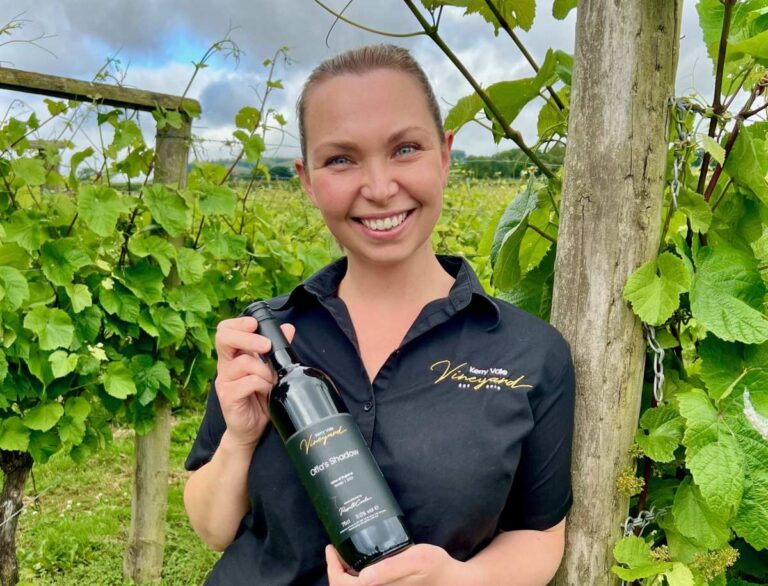 Kerry Vale Vineyard’s hospitality manager Hayley Kiddle with ta bottle of the bronze medal winning red wine Offa’s Shadow