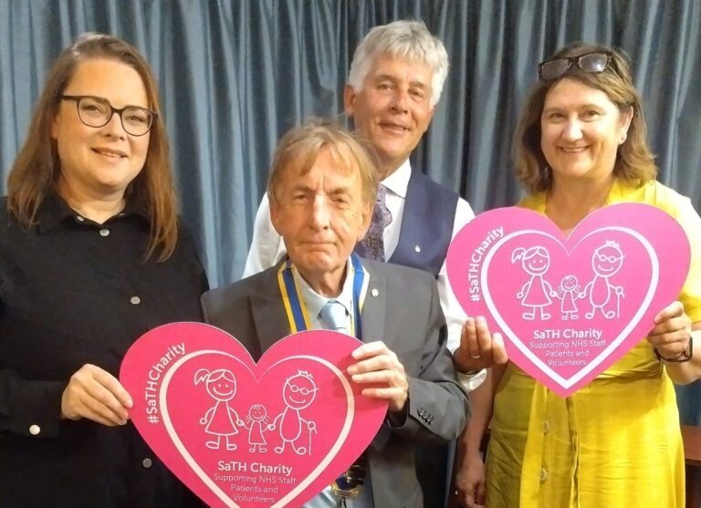 Visitors Nic Brockley and Sarah Biffen with Rotarians David Morris and Johnathan Callwood