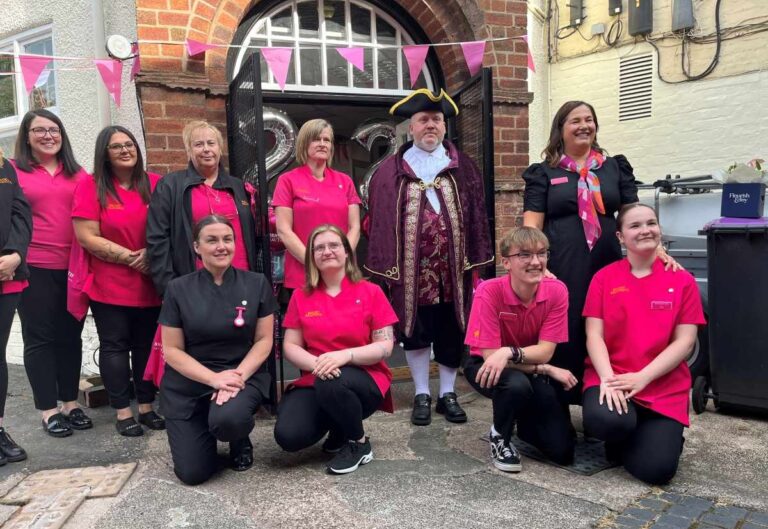 Wellington's Town Crier, Damian Breeze, who manages the Wellington Orbit, congratulated the Bright & Beautiful team and cut a ribbon to declare its new offices officially open