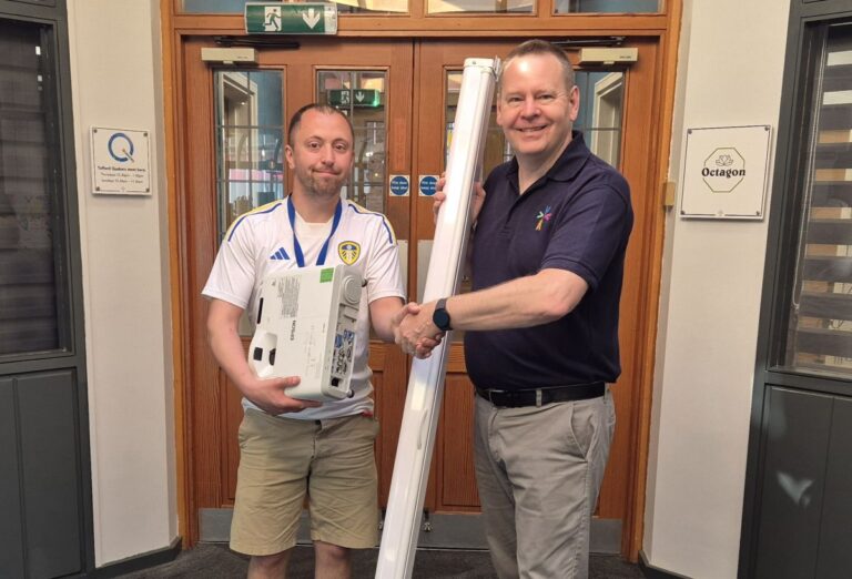 Alan Watkins of Silver Threads Community Hall with Wayne Jenson at Meeting Point House