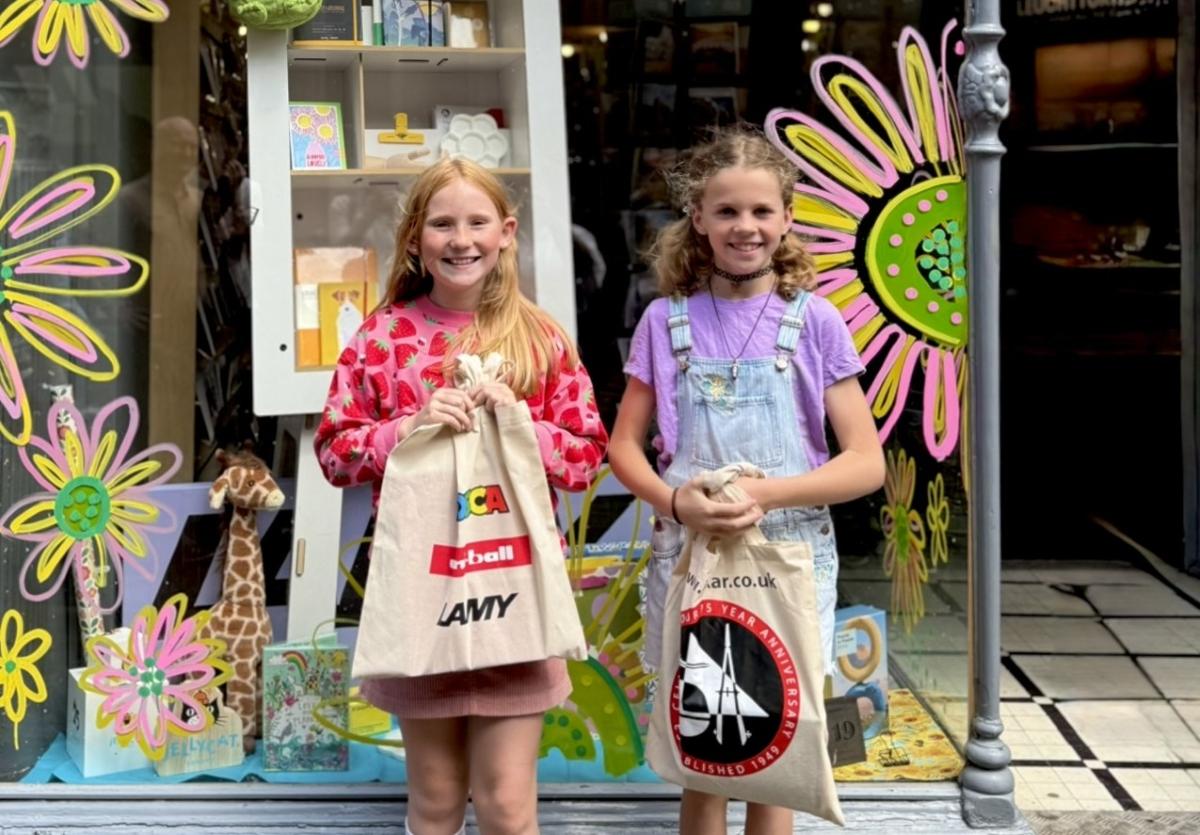 Josie and Pippa celebrate joint win in the Shrewsbury Town Flag competition